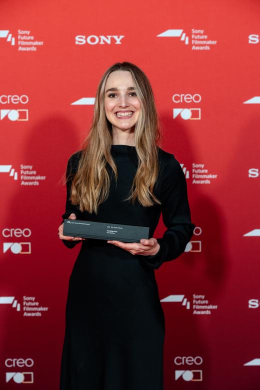 Juliet Klottrup (UK), winner of the Non-Fiction category with her trophy at the Sony Future Filmmaker Awards 2025 ceremony