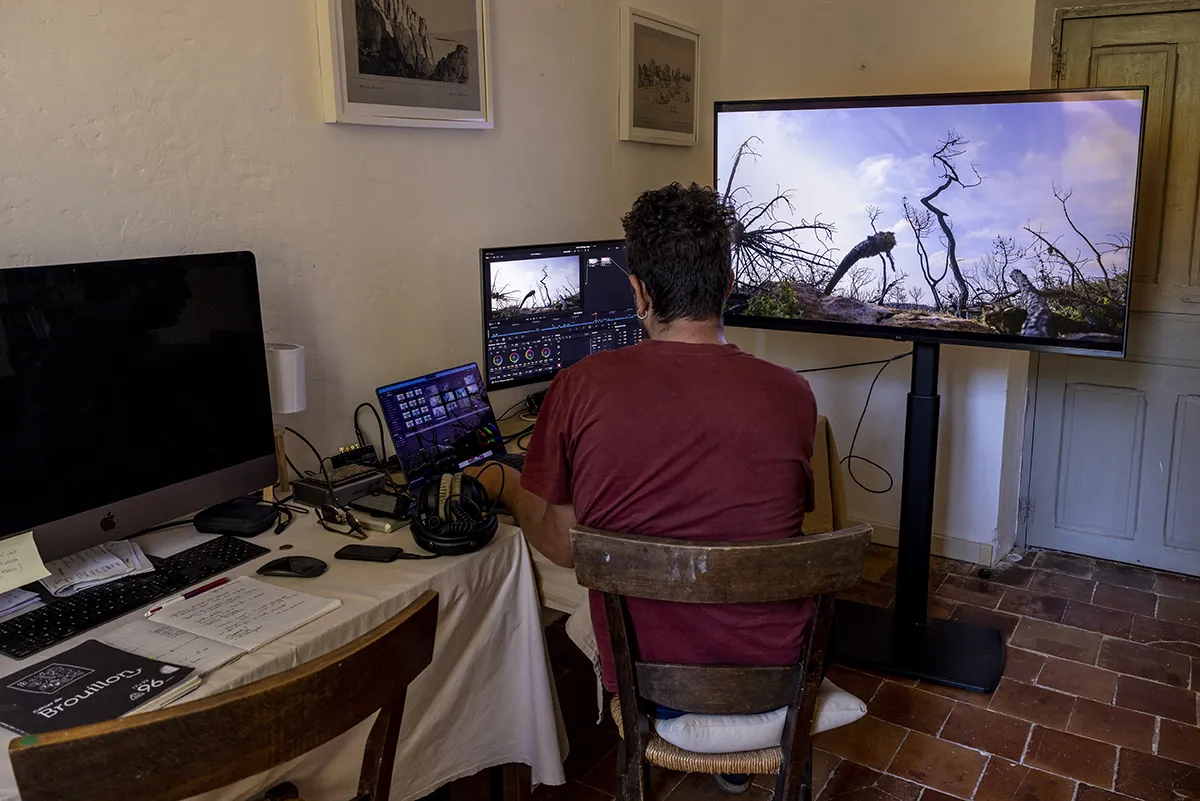 Jacob Redman in his studio editing his recent film Sem la Beluga