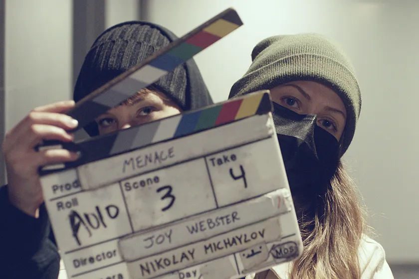 Joy Webster on set with Menace lead Michaela Kurimsky