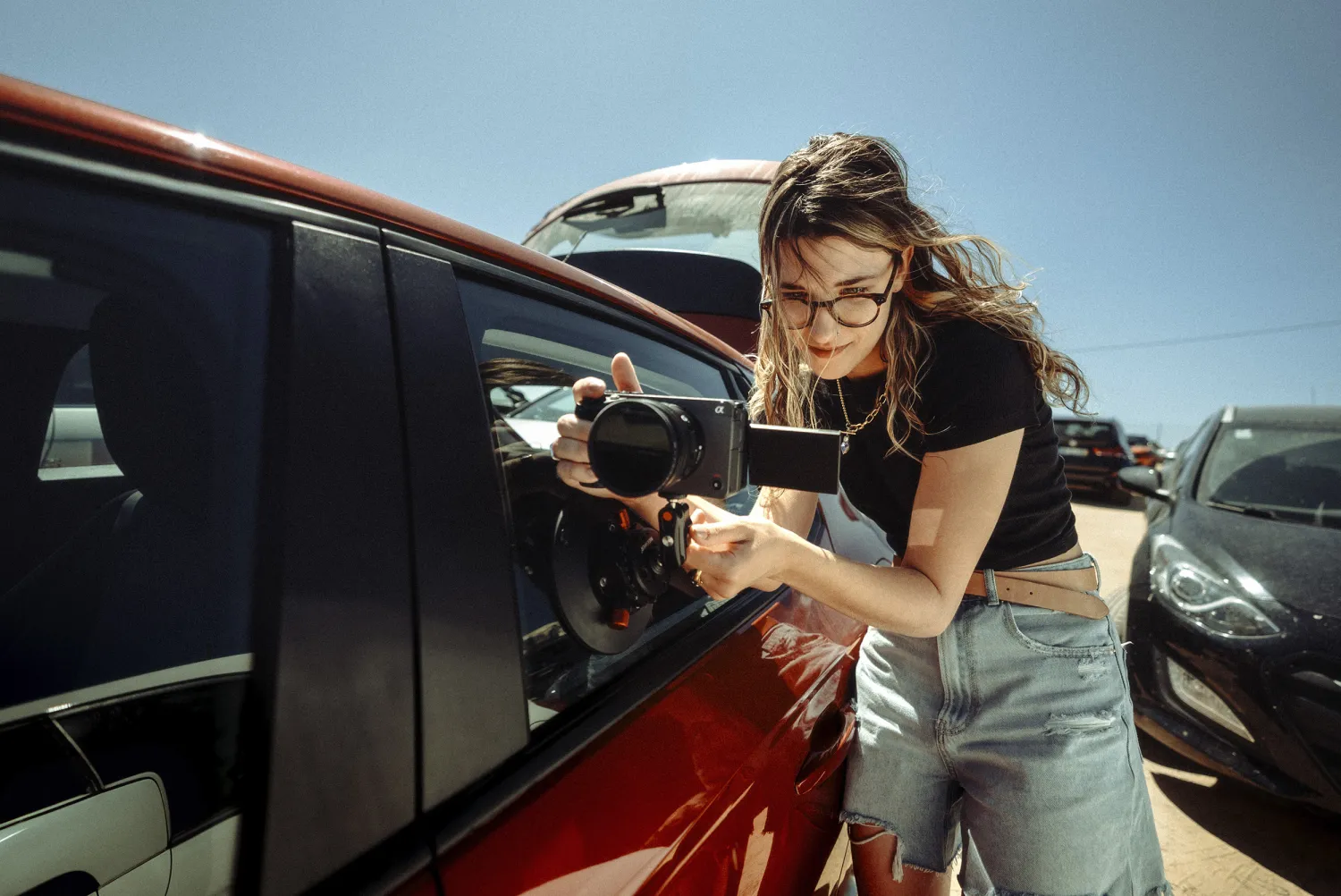 Teja Lisjak holding her sony fx30 with 18-105 lens
