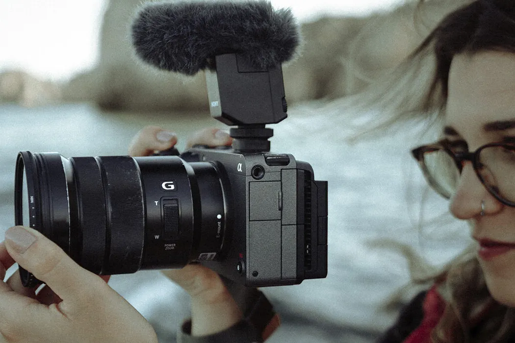 Teja Lisjak holding her Sony FX30 with 18-105mm lens